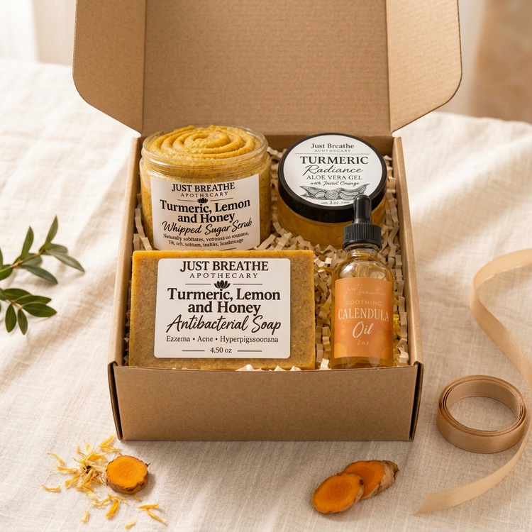 Golden Glow Turmeric Ritual Set in a kraft mailer box with sugar scrub, aloe vera gel, soap and calendula oil